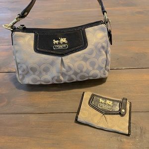 Coach shoulder bag and matching wallet.